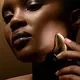 Масажний камінь для обличчя Clarins Precious Gold